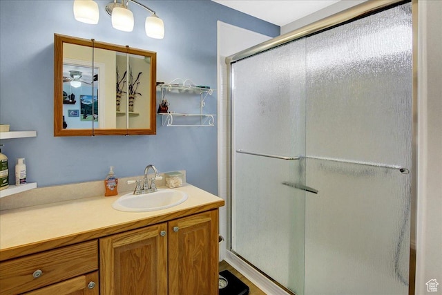 1422 N Fowler Ave E, Ogden, UT 84404 - bathroom featuring a shower stall, vanity, and ceiling fan