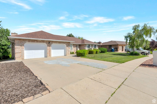 5760 S 1050 E, South Ogden, UT 84405 - single story home featuring a garage, concrete driveway, a front yard, brick siding, and a shingled roof