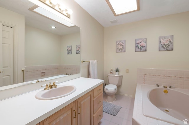 5760 S 1050 E, South Ogden, UT 84405 - full bath featuring tile patterned flooring, a bath, toilet, vanity, and baseboards