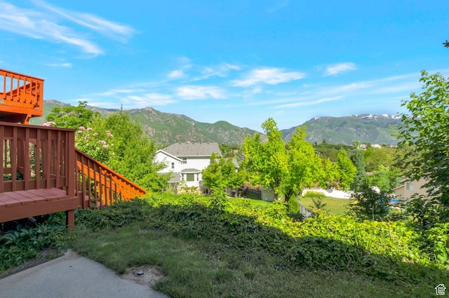 5760 S 1050 E, South Ogden, UT 84405 - view of yard featuring a deck with mountain view