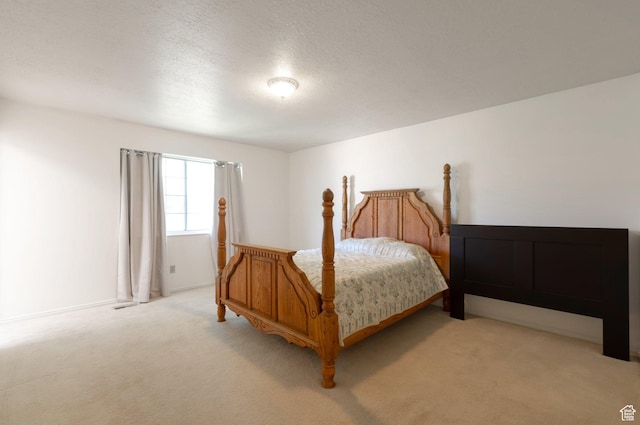 5760 S 1050 E, South Ogden, UT 84405 - bedroom featuring light carpet and a textured ceiling