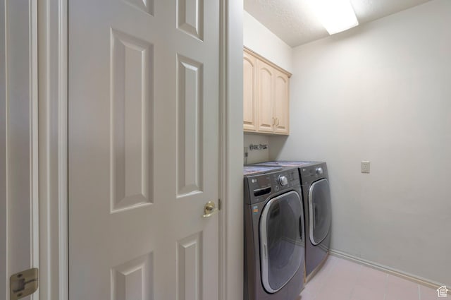 5760 S 1050 E, South Ogden, UT 84405 - laundry room with washing machine and clothes dryer, cabinet space, and baseboards