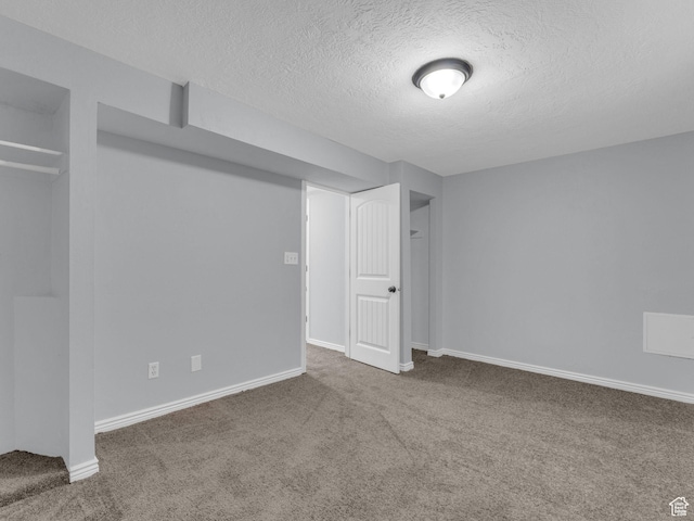 8335 S 1050 E, Sandy, UT 84094 - basement with carpet flooring, a textured ceiling, and baseboards