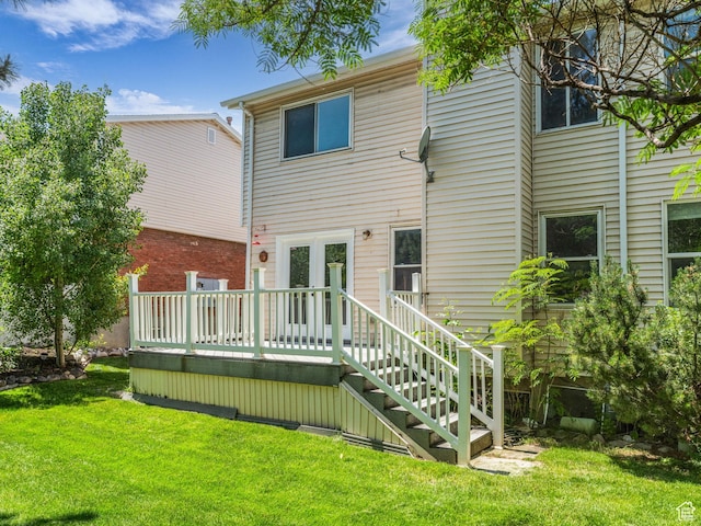8335 S 1050 E, Sandy, UT 84094 - back of house featuring a deck and a yard