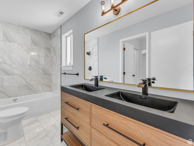 8335 S 1050 E, Sandy, UT 84094 - bathroom featuring toilet, marble finish flooring, double vanity, and bathing tub / shower combination
