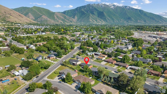 1185 E Hillcrest Dr, Springville, UT 84663 - aerial view of property and surrounding area with mountains and nearby suburban area