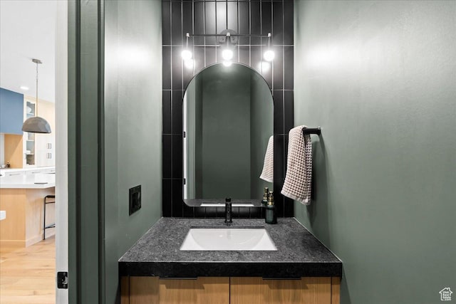 11527 S River Front Pkwy W, South Jordan, UT 84095 - bathroom with vanity and wood finished floors