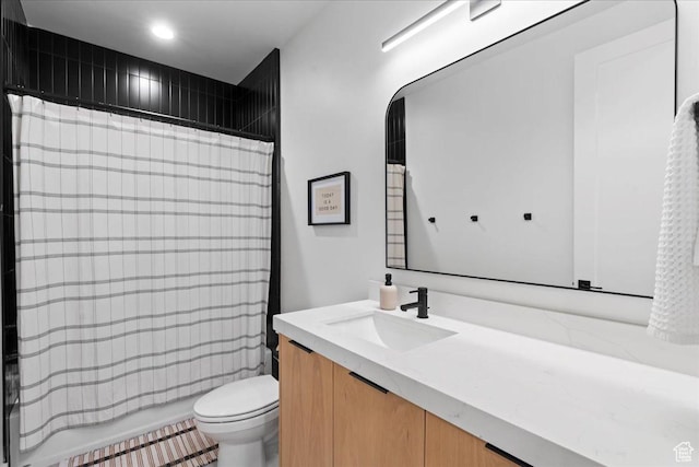 11527 S River Front Pkwy W, South Jordan, UT 84095 - bathroom with vanity, toilet, shower / bathtub combination with curtain, and recessed lighting