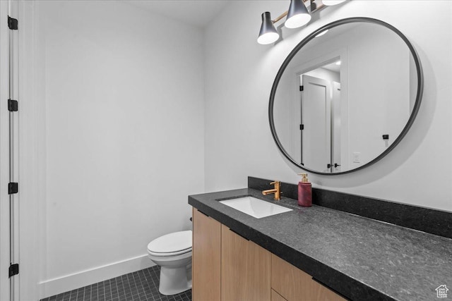 11527 S River Front Pkwy W, South Jordan, UT 84095 - bathroom with vanity, toilet, tile patterned flooring, and baseboards