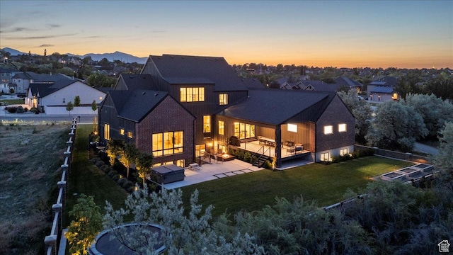 11527 S River Front Pkwy W, South Jordan, UT 84095 - back of property featuring a deck, a patio, and a residential view