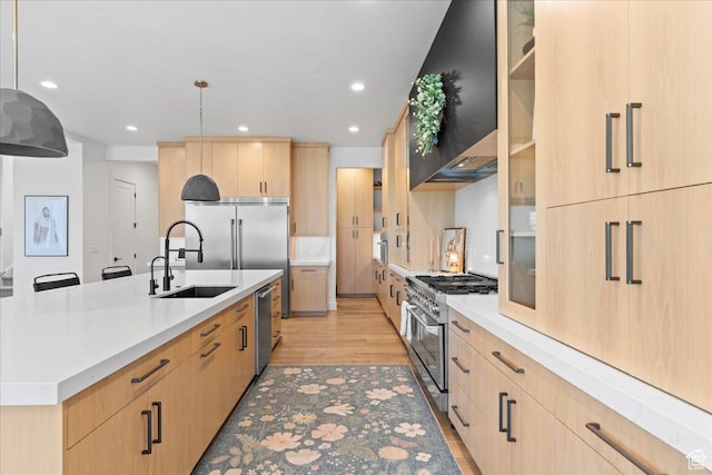 11527 S River Front Pkwy W, South Jordan, UT 84095 - kitchen featuring light brown cabinetry, high end appliances, a sink, and recessed lighting