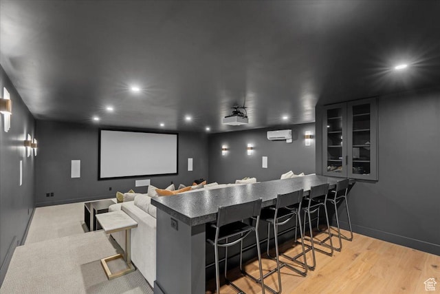 11527 S River Front Pkwy W, South Jordan, UT 84095 - home theater with a wall mounted air conditioner, recessed lighting, wood finished floors, and baseboards