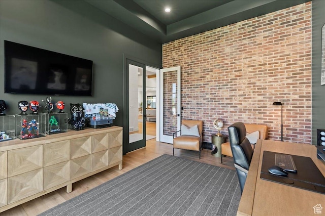 11527 S River Front Pkwy W, South Jordan, UT 84095 - office with french doors, light wood-style flooring, and brick wall