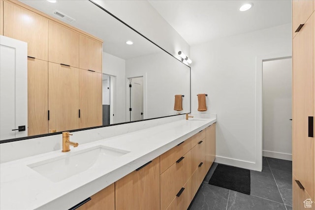 11527 S River Front Pkwy W, South Jordan, UT 84095 - full bathroom featuring double vanity, tile patterned flooring, baseboards, and recessed lighting