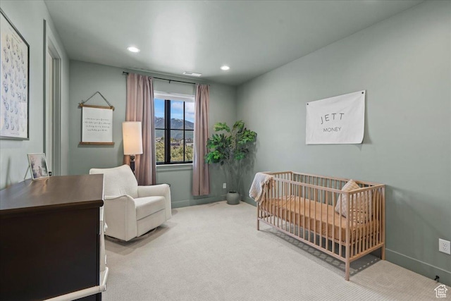 11527 S River Front Pkwy W, South Jordan, UT 84095 - bedroom with carpet flooring, baseboards, a crib, and recessed lighting