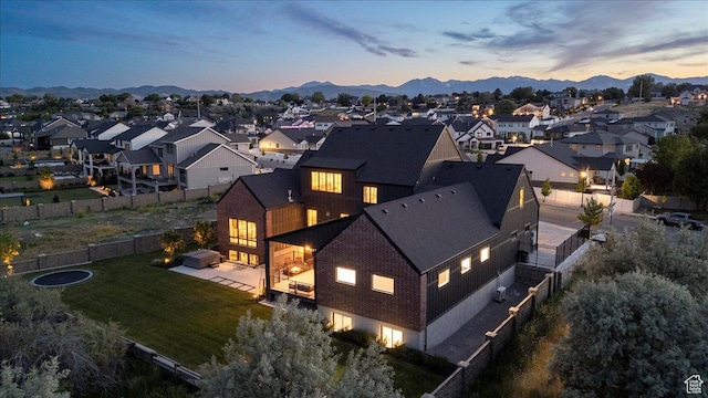 11527 S River Front Pkwy W, South Jordan, UT 84095 - aerial view at dusk of a mountain view and a residential view
