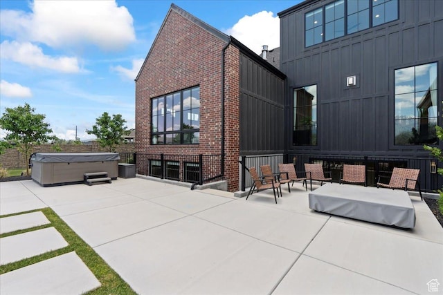 11527 S River Front Pkwy W, South Jordan, UT 84095 - view of patio with a hot tub