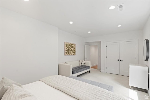 11527 S River Front Pkwy W, South Jordan, UT 84095 - bedroom featuring recessed lighting, light colored carpet, and a closet
