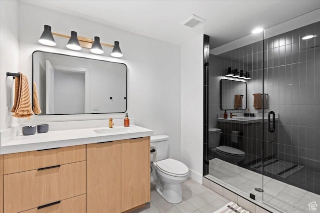 11527 S River Front Pkwy W, South Jordan, UT 84095 - bathroom featuring toilet, vanity, a stall shower, and tile patterned flooring