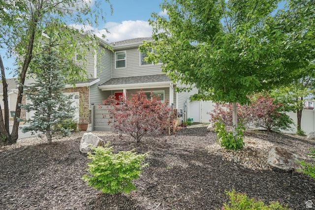 157 N Keogh Ln W, Ogden, UT 84404 - view of front of house featuring roof with shingles