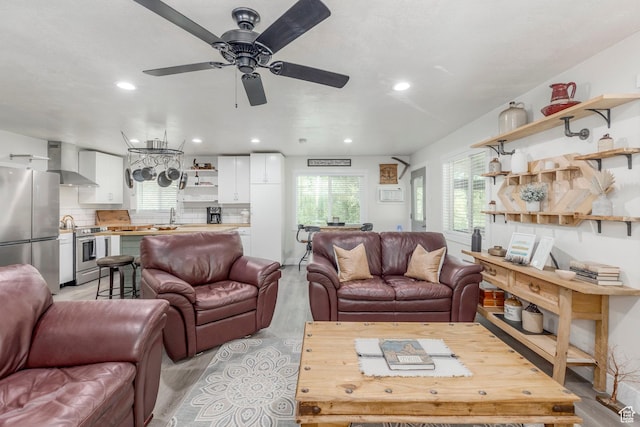 2237 Samak Park Ct Unit 4, Kamas, UT 84036 - living area featuring light wood finished floors, a ceiling fan, and recessed lighting