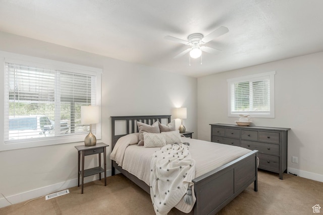 2237 Samak Park Ct Unit 4, Kamas, UT 84036 - bedroom with light carpet, baseboards, and a ceiling fan