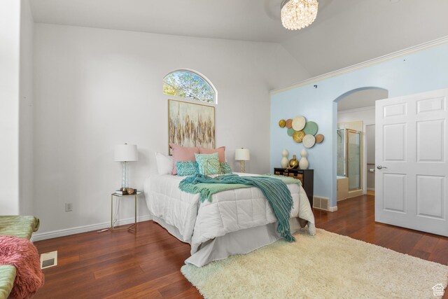 2271 W Pointe Meadow Dr N, Lehi, UT 84043 - bedroom with arched walkways, wood finished floors, vaulted ceiling, and baseboards