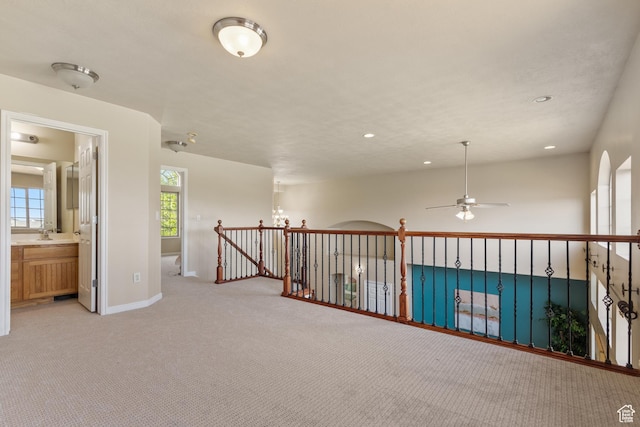 2271 W Pointe Meadow Dr N, Lehi, UT 84043 - hallway with light carpet, recessed lighting, baseboards, and an upstairs landing