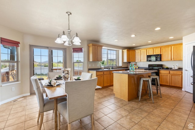 2271 W Pointe Meadow Dr N, Lehi, UT 84043 - kitchen featuring black microwave, a kitchen island, a chandelier, recessed lighting, and a sink