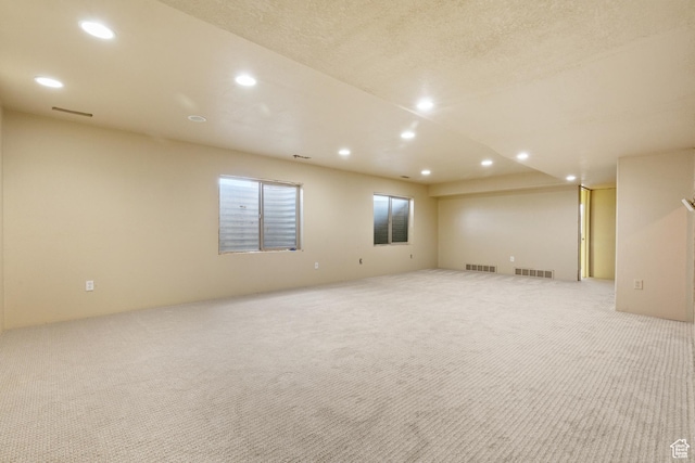2271 W Pointe Meadow Dr N, Lehi, UT 84043 - empty room with light carpet and recessed lighting