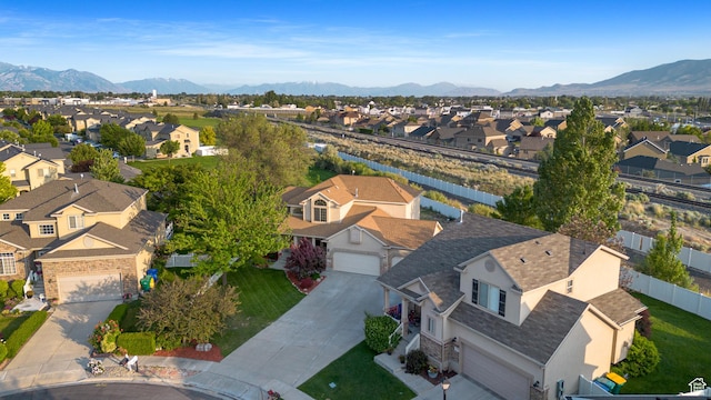 2271 W Pointe Meadow Dr N, Lehi, UT 84043 - aerial view of residential area with a mountainous background