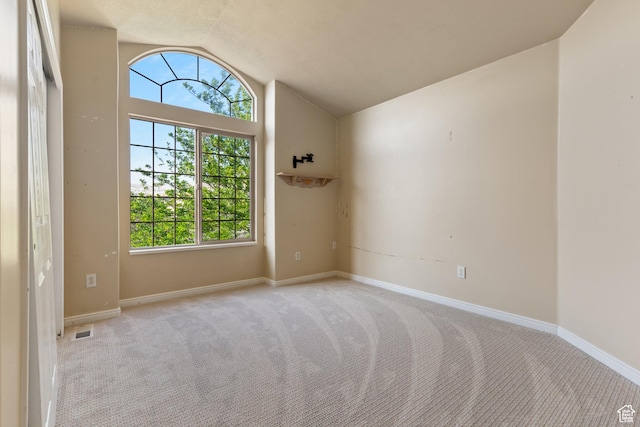 2271 W Pointe Meadow Dr N, Lehi, UT 84043 - spare room with lofted ceiling, light colored carpet, and baseboards