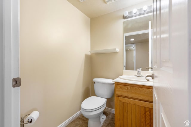2271 W Pointe Meadow Dr N, Lehi, UT 84043 - bathroom featuring vanity, toilet, tile patterned floors, and baseboards