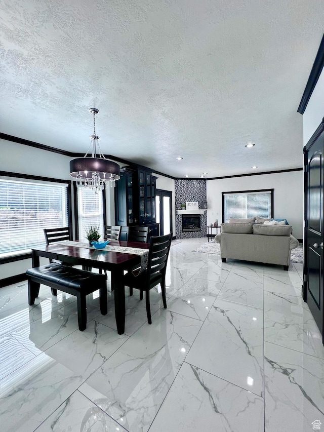 4433 Devonshire Dr W, Bountiful, UT 84010 - dining area featuring plenty of natural light, a textured ceiling, a chandelier, a fireplace, and recessed lighting