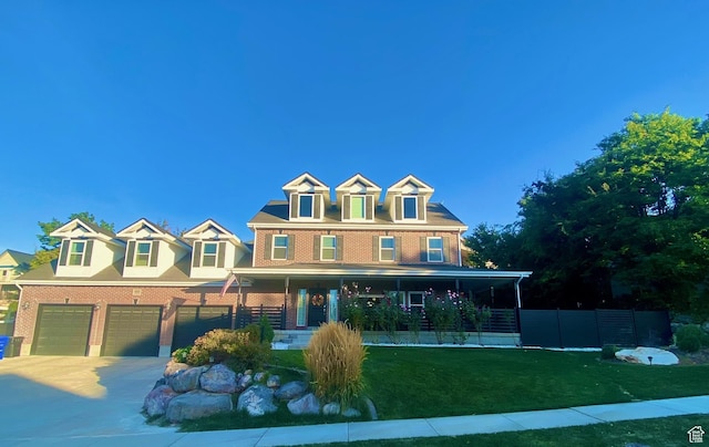 4433 Devonshire Dr W, Bountiful, UT 84010 - view of front facade featuring covered porch, a garage, concrete driveway, and brick siding
