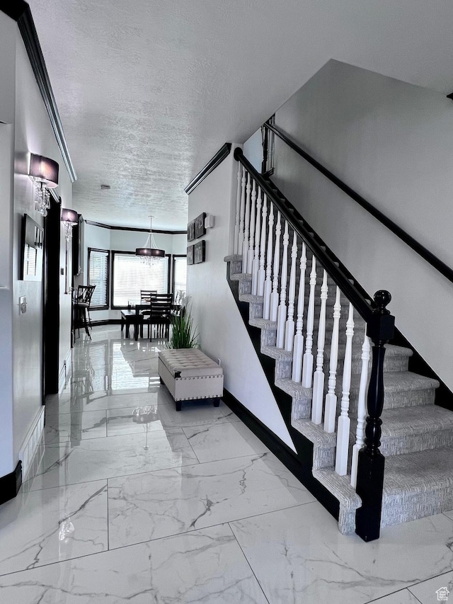 4433 Devonshire Dr W, Bountiful, UT 84010 - stairs with baseboards, marble finish flooring, and a textured ceiling