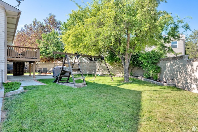 6767 S 1600 W, West Jordan, UT 84084 - view of yard with a patio area, a wooden deck, and a playground
