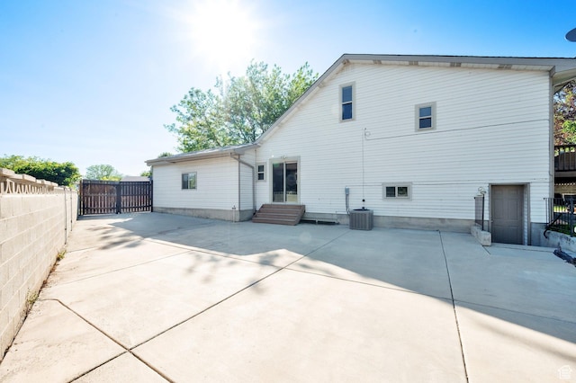 6767 S 1600 W, West Jordan, UT 84084 - back of house with a patio and central air condition unit