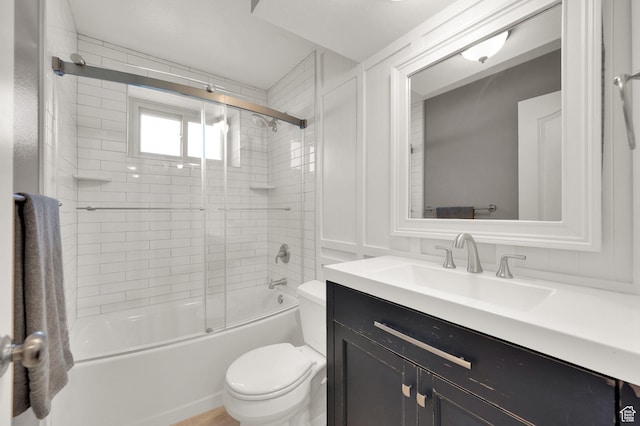 6767 S 1600 W, West Jordan, UT 84084 - full bath featuring toilet, vanity, and bath / shower combo with glass door