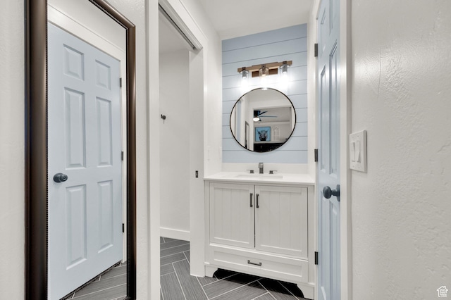 6767 S 1600 W, West Jordan, UT 84084 - bathroom with vanity, ceiling fan, and a textured wall