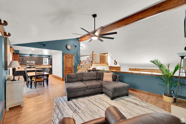 6767 S 1600 W, West Jordan, UT 84084 - living room with ceiling fan, stairs, light wood-style flooring, baseboards, and beam ceiling