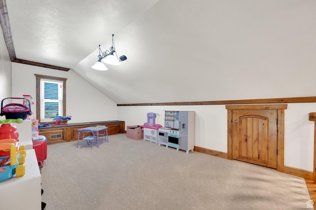 6767 S 1600 W, West Jordan, UT 84084 - game room with lofted ceiling, carpet flooring, and baseboards