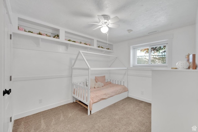 6767 S 1600 W, West Jordan, UT 84084 - bedroom with carpet flooring, baseboards, a ceiling fan, and a textured ceiling