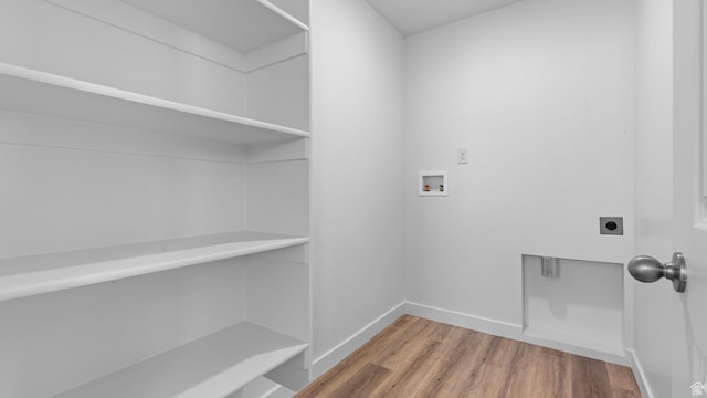 104 N Kelp Ln Unit 2310, Saratoga Springs, UT 84045 - laundry area with electric dryer hookup, hookup for a washing machine, light wood finished floors, and baseboards