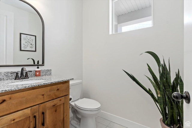 1046 W Seasons View Ct, Lehi, UT 84043 - half bathroom featuring tile patterned flooring, toilet, vanity, and baseboards