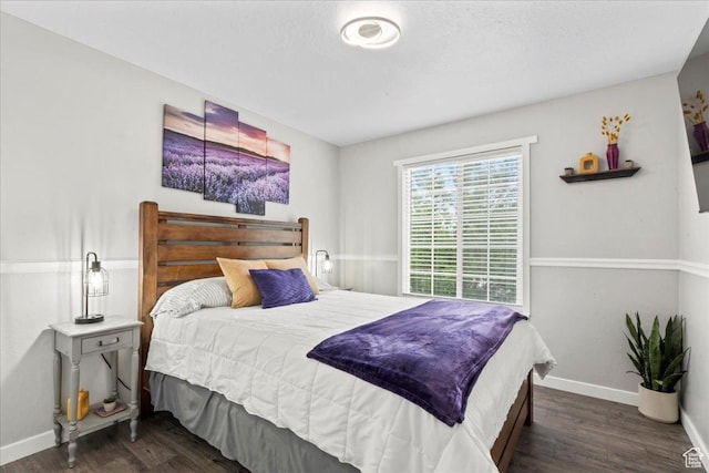 7265 N Ute Dr, Eagle Mountain, UT 84005 - bedroom featuring wood finished floors and baseboards