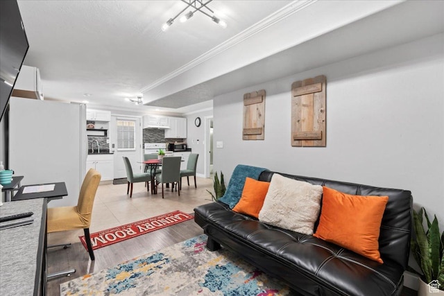 7265 N Ute Dr, Eagle Mountain, UT 84005 - living area with ornamental molding and light wood-type flooring