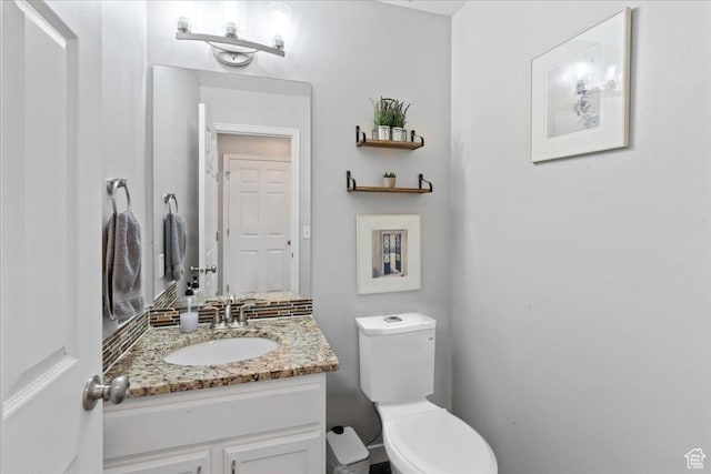 7265 N Ute Dr, Eagle Mountain, UT 84005 - half bathroom featuring vanity and toilet
