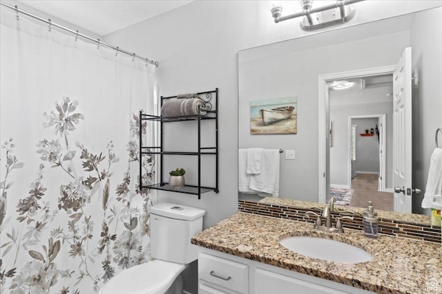 7265 N Ute Dr, Eagle Mountain, UT 84005 - bathroom featuring vanity, toilet, and a shower with curtain