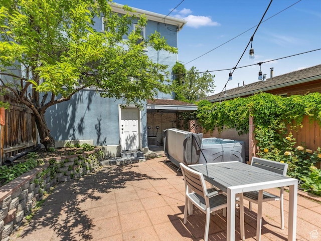 218 E Fifth Ave, Salt Lake City, UT 84103 - fenced backyard featuring a patio area and outdoor dining space